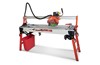 RUBI&#39;s DCX-250 Xpert range of professional cutters are designed for the intensive cutting of porcelain stoneware tiles (BIA) and any other type of ceramic tile (BIIa / BIIb / BIII / AIB) while allowing an occasional cutting of pieces of natural stone. With a highly reinforced aluminum chassis and an innovative triple beam system with steel fronts to improve the stability and rigidity of the entire chassis. The cooling system is completed with a double steel decanter for more efficient recovery of the used water, directed towards the external water tank of 30 liters of capacity. The models of the DCX-250 Xpert range incorporate reinforced handles and wheels (off-road type), which provide a better experience in transporting and handling the cutters. Its folding system with reinforced legs includes a quick locking system with a safety device that prevents involuntary folding during work or any possible movements that we can experience at job sites. In addition, the DCX tile cutter includes a regulator that assists in the correct leveling of the cutting table.