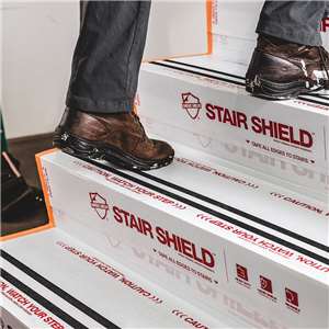 Protect the stairs of your jobsite with Stair Shield™. This heavy-duty, yet lightweight temporary stair protection product protects every part of the stair including the stair tread, riser, and bullnose. Once taped to the surface of the stairs, Stair Shield protects from damage, water, paint, mud, and more. The stair protector is impact resistant and has a grip strip on the back which increases traction with the surface of the stairs. These features make this stair protection perfect for heavy foot traffic areas and offers ideal jobsite protection.

Stair Shield is a fluted-polypropylene, temporary stair protection product that is both reusable and recyclable. Comes with an adjustable tread that protects 10.25”, 11”, and 11.25” treads and is offered in 34” wide and 40” wide sizes.